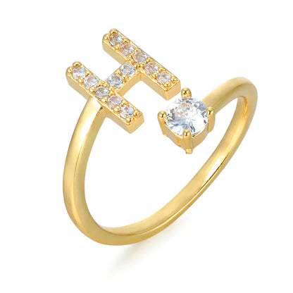 Zirconium ring with letters